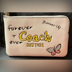 Coach Cream Color Leather Clutch with Yellow Accents